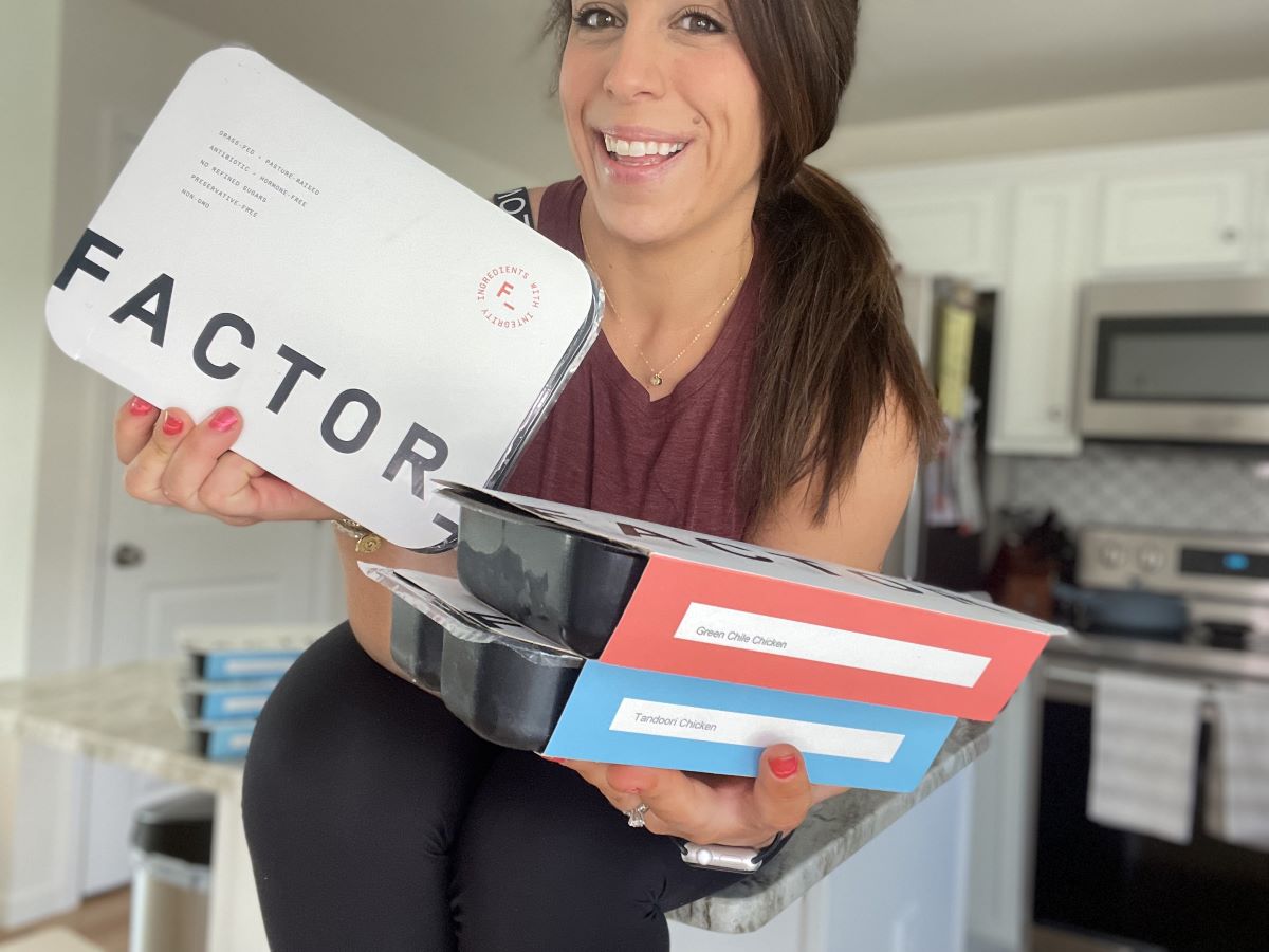 woman holding Factor meals