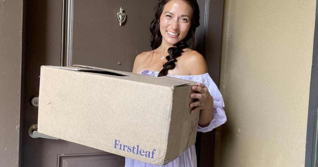 woman holding firstleaf wine box