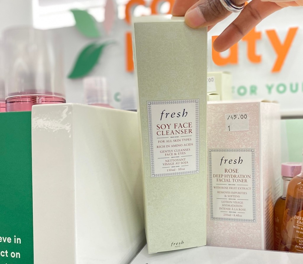 hand holding a box with Fresh Soy Face Cleanser
