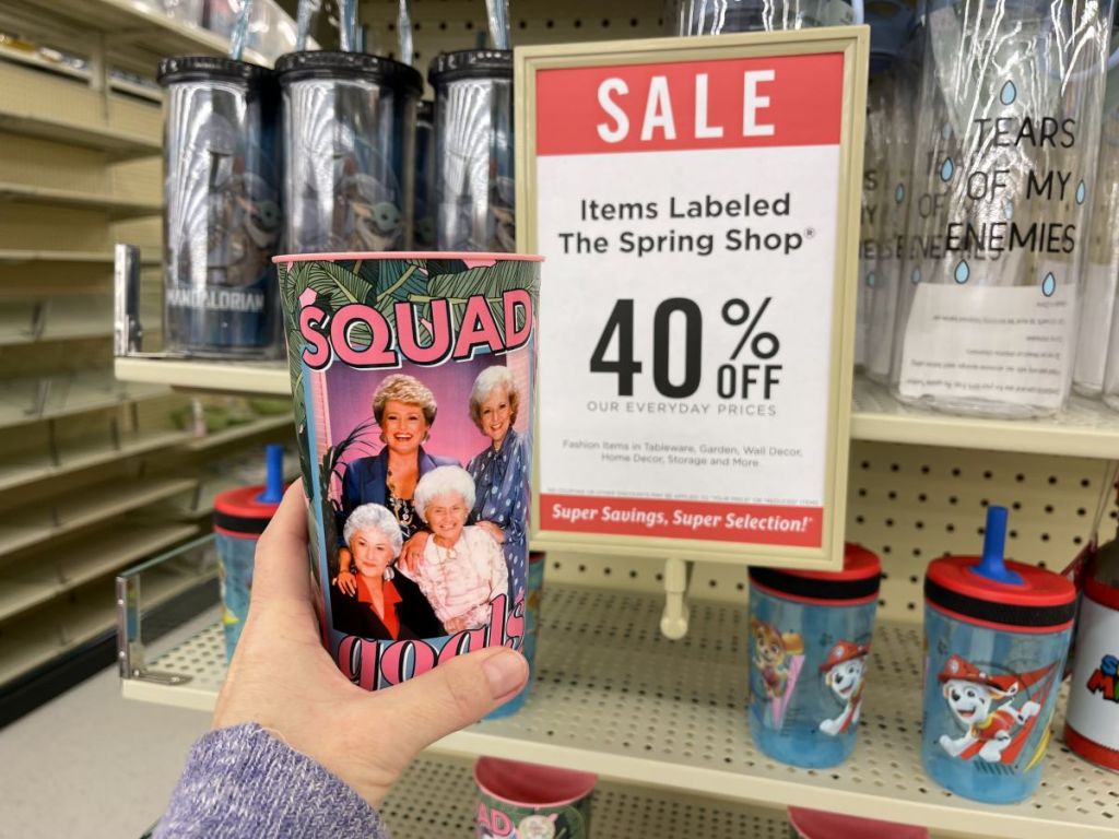 hand holding a Golden Girls Squad Goals Cup