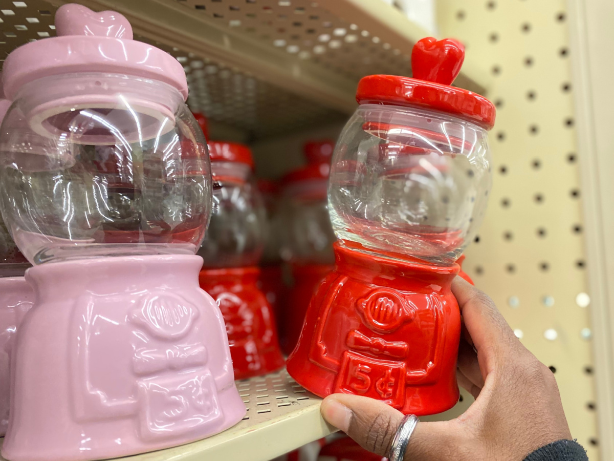 pink and red Valentine's Day gumball machines on store shelf