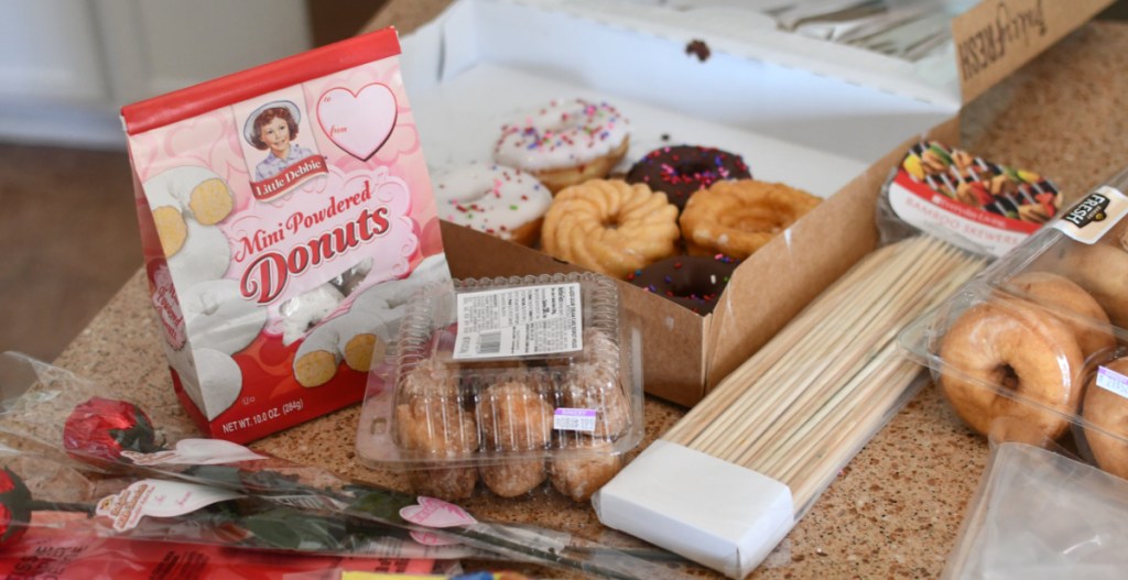 Supplies needed to create a DIY Valentine's Day donut bouquet