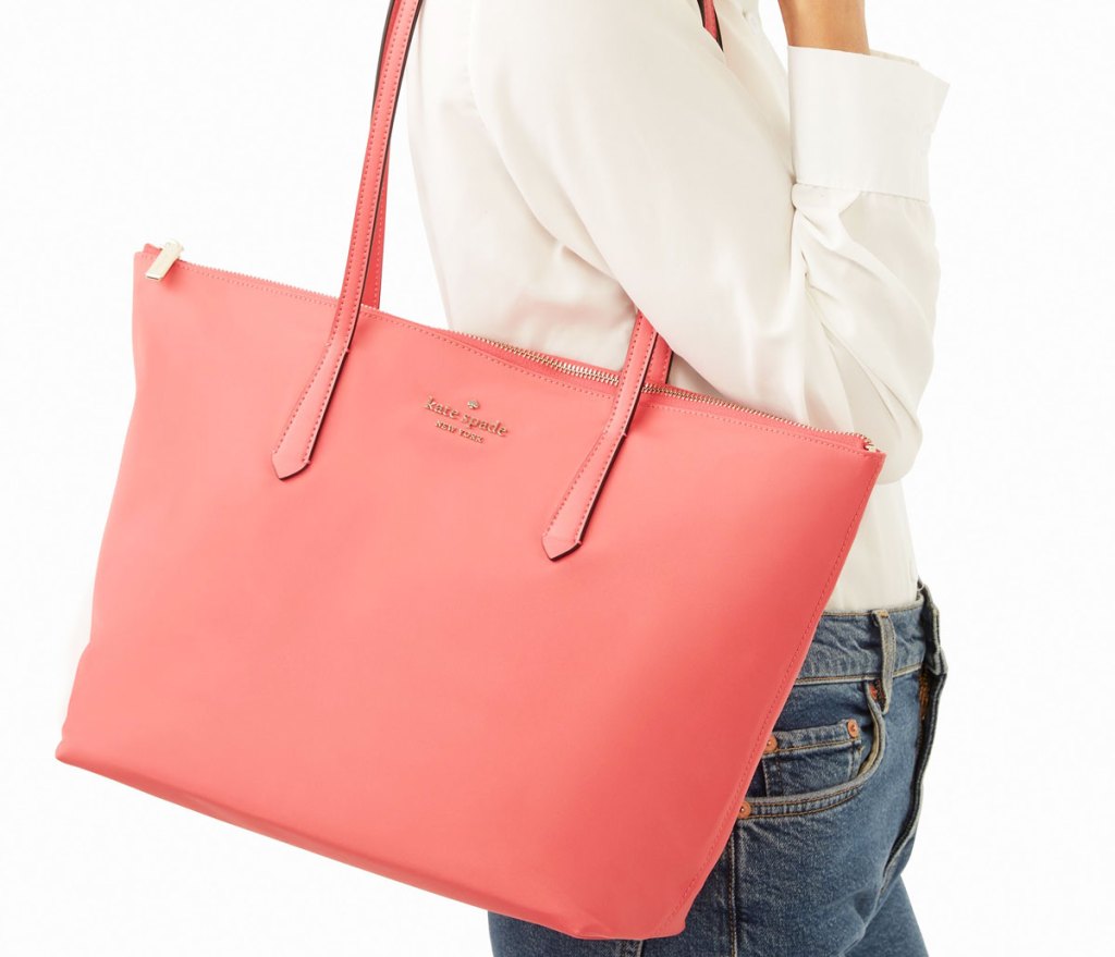 woman with pink kate spade tote bag