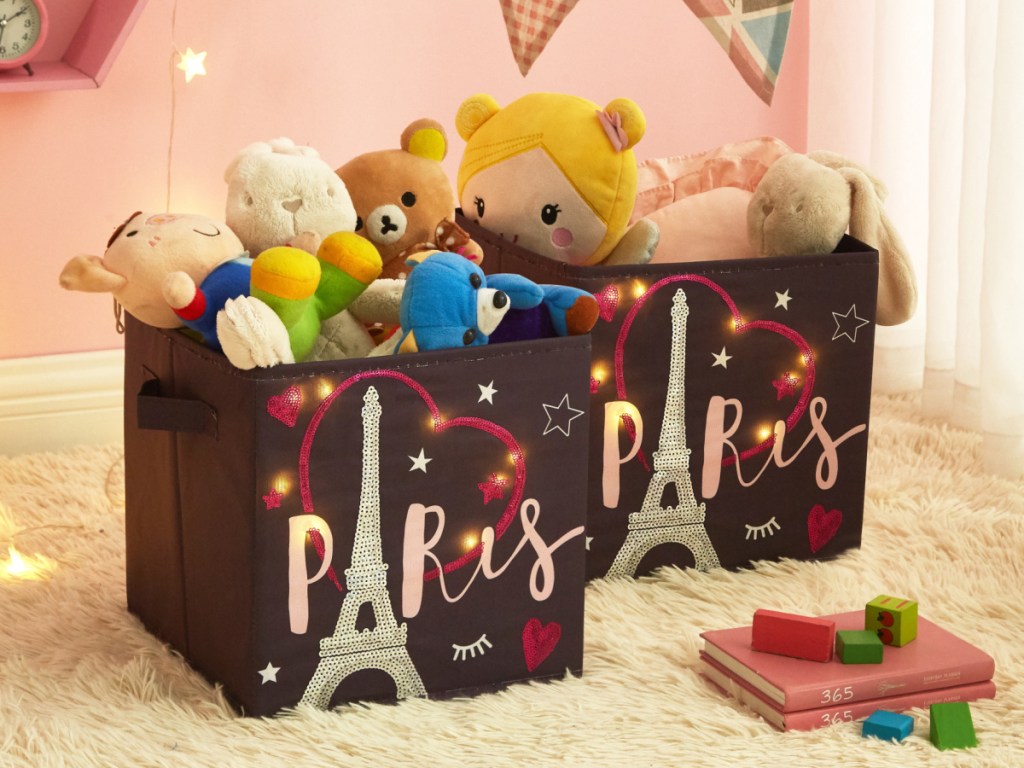 two Paris storage cubes filled with toys