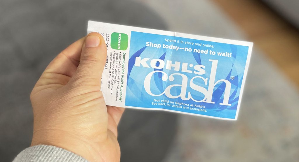 hand holding kohl's cash