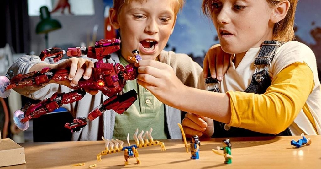 kids playing with LEGO Eternals in Arishem's Shadow 493-Piece Set