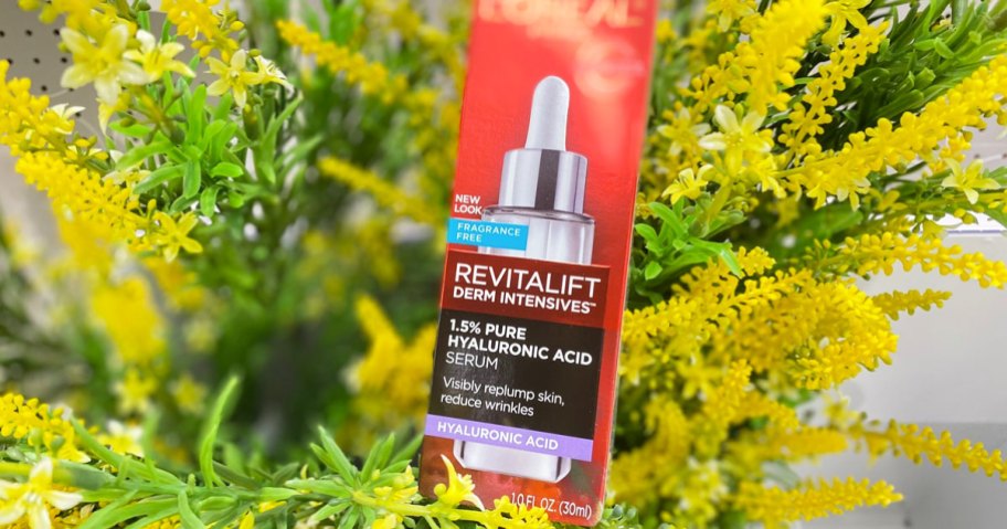 L'Oreal Paris Revitalift Pure Hyaluronic Acid Serum in a yellow plant