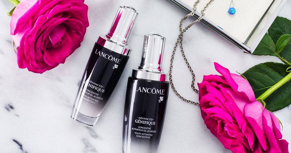 two bottles of Lancome Advanced Genifique with pink roses