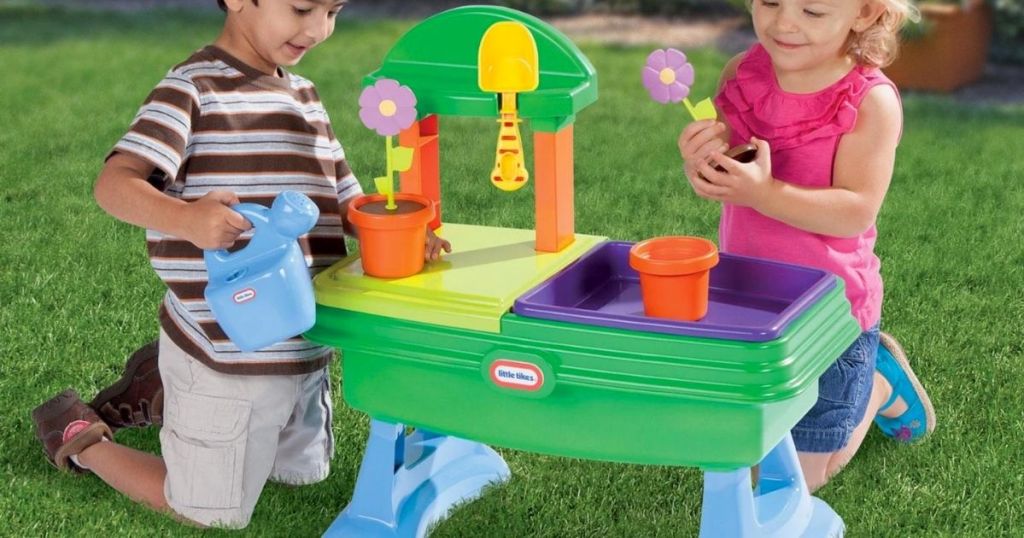 little tikes flower garden table playset with kids playing