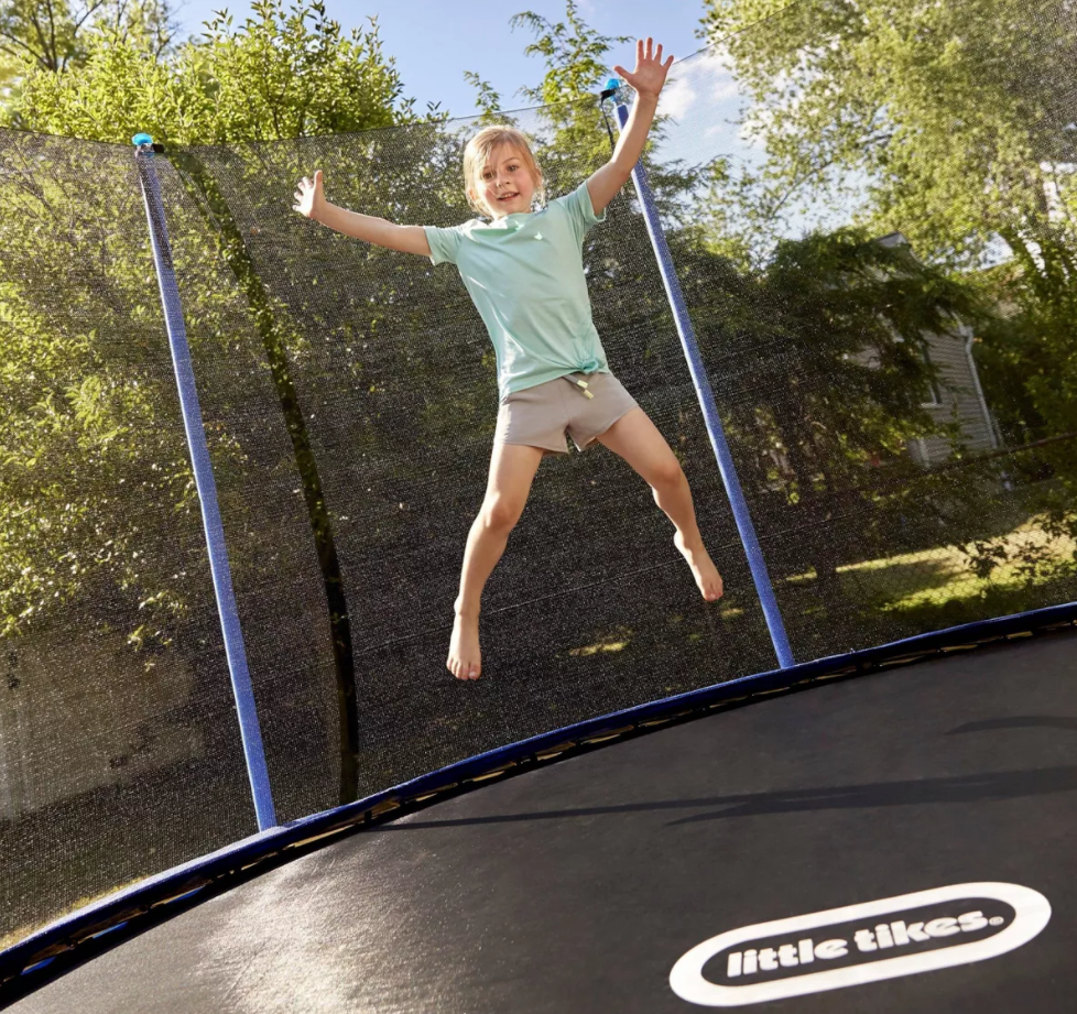girl jumping on a trampoline