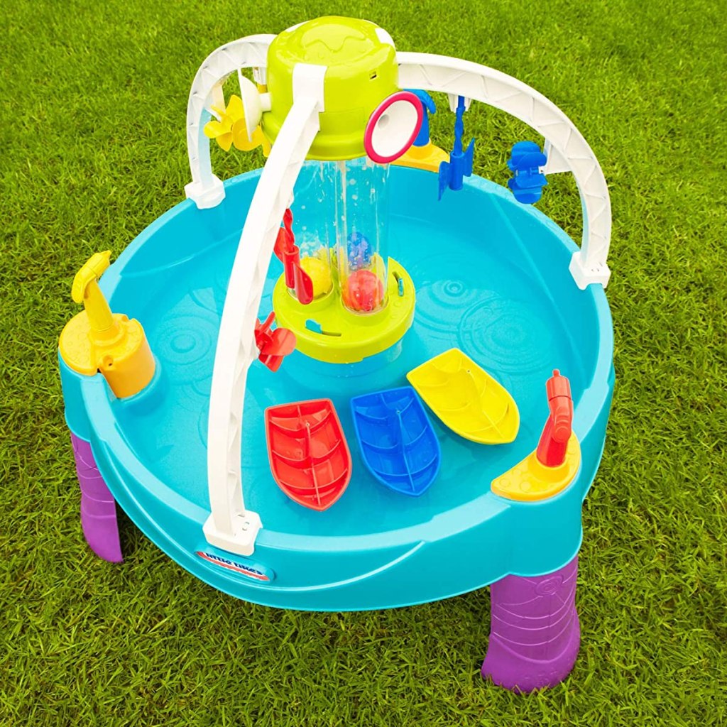 kids water table sitting on grass