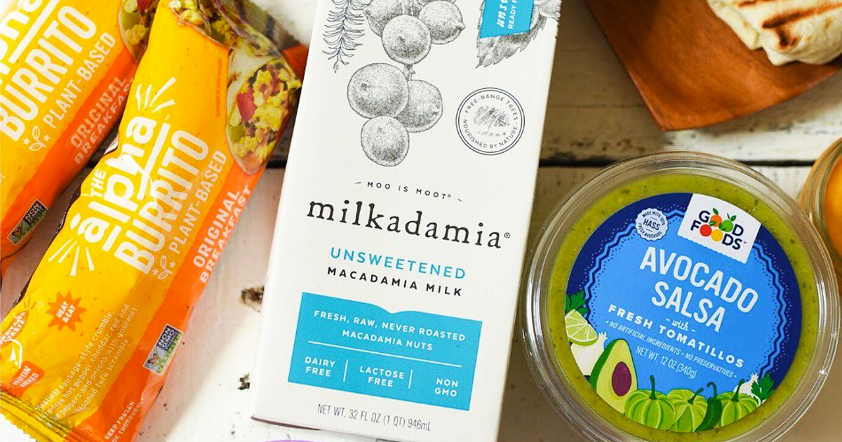 Milkadamia milk carton surrounded by other groceries