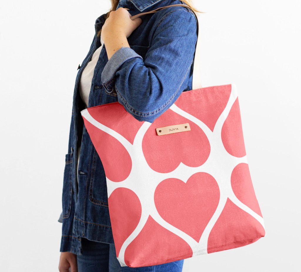 woman with heart print tote bag