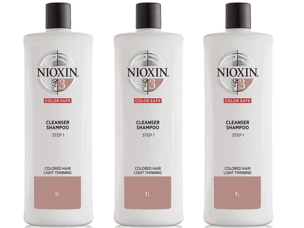 3 Nioxin cleanser shampoo bottles