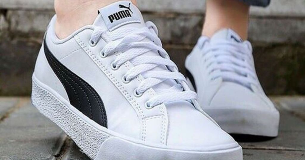 white and black puma shoes