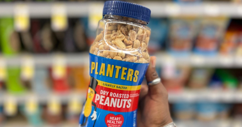 Planters Peanuts in woman's hand