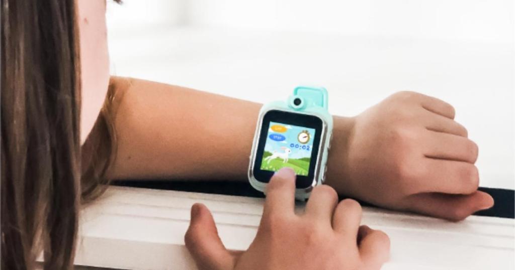 girl wearing playzoom 2 smartwatches