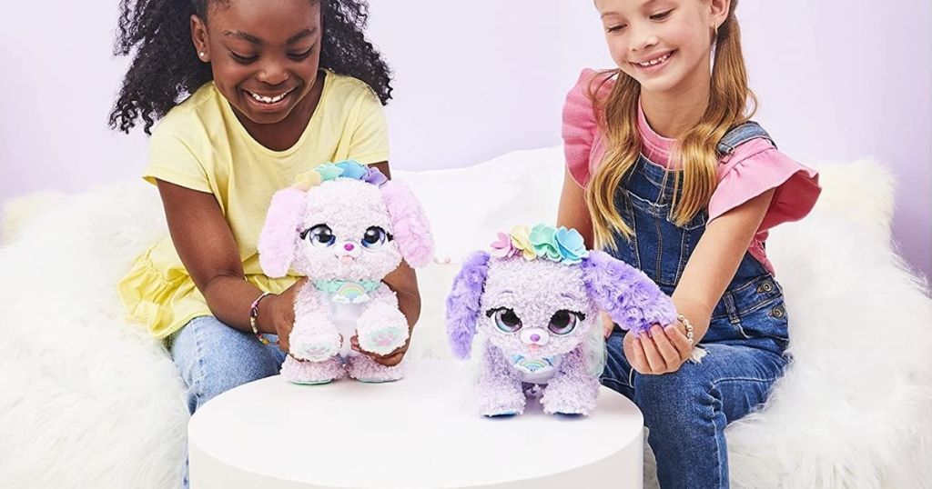 two girls playing with Fairy Puppy Interactive Plush Toy