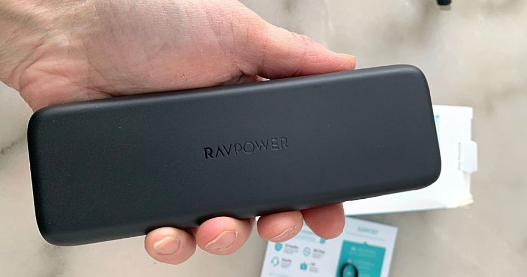 hand holding Portable Charger Power Bank