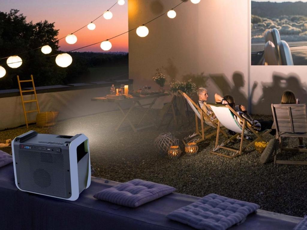 rca portable and rechargeable projector projecting to wall
