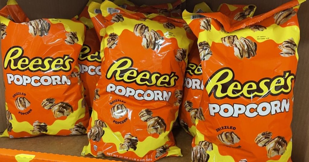 three bags of Reese's Popcorn