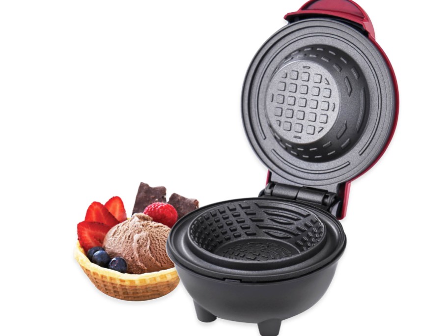 mini waffle bowl maker with waffle bowl filled with ice cream next to it