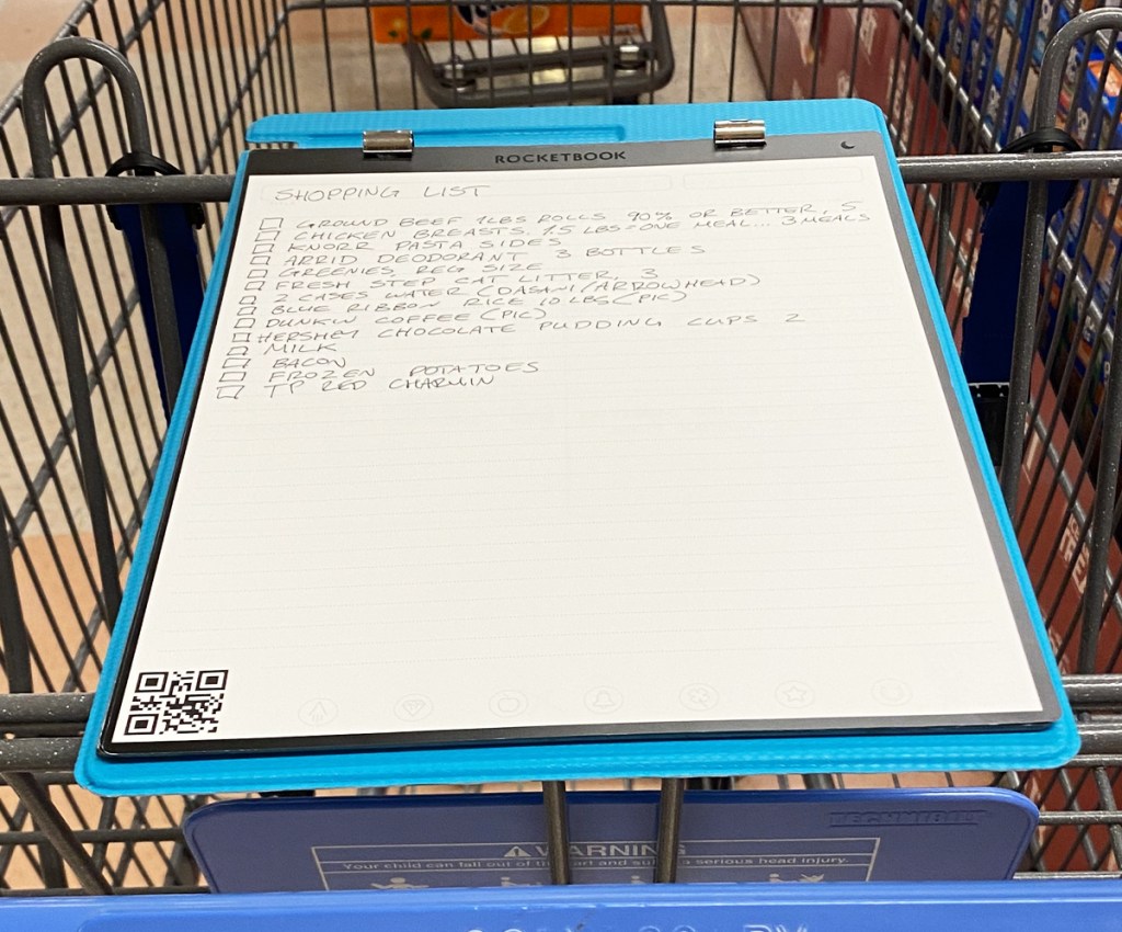 Rocketbook Orbit Legal Pad with a grocery list on top of a shopping cart