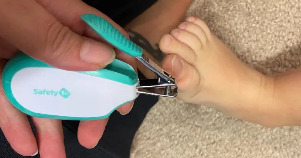 mom using Safety 1st Nail Clippers on toe
