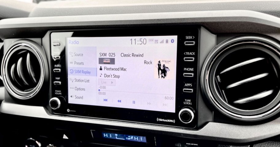 SiriusXM radio playing on car dashboard screen