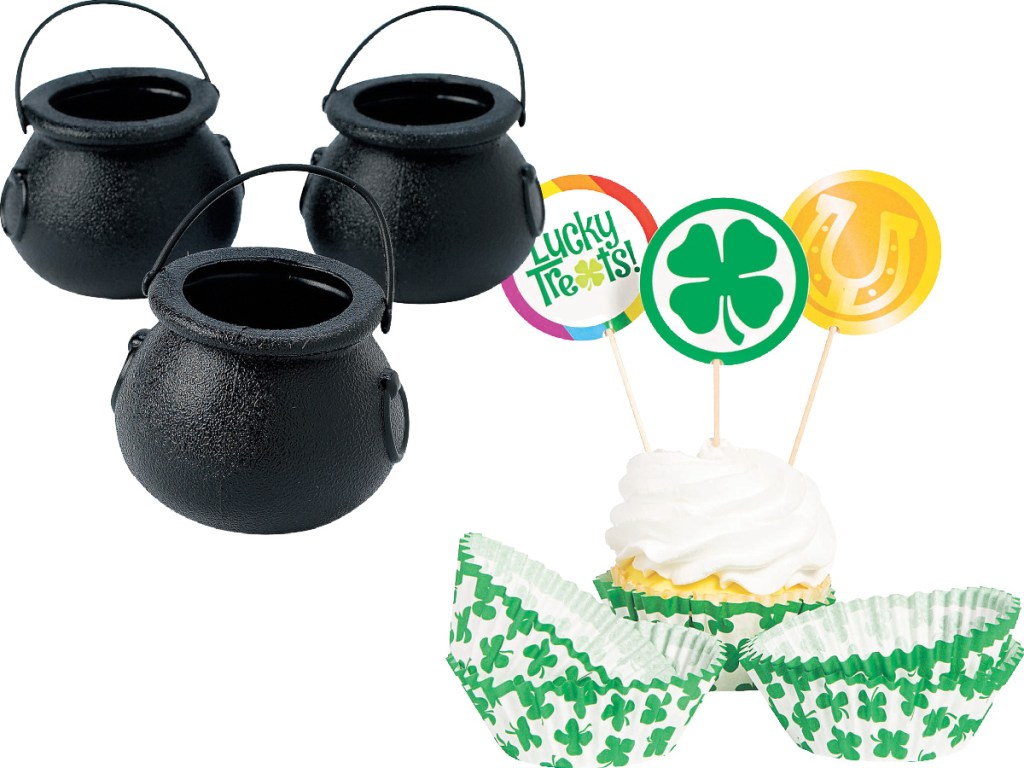 three black cauldrons and St. Patrick's Day cupcake liners and picks