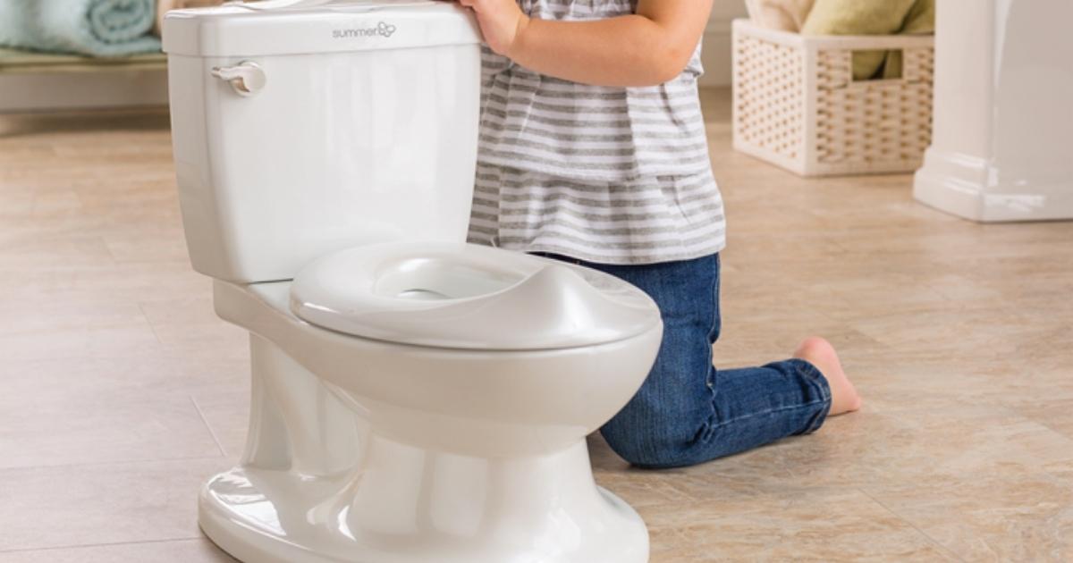 little girl with summer infant my size potty trainer potty