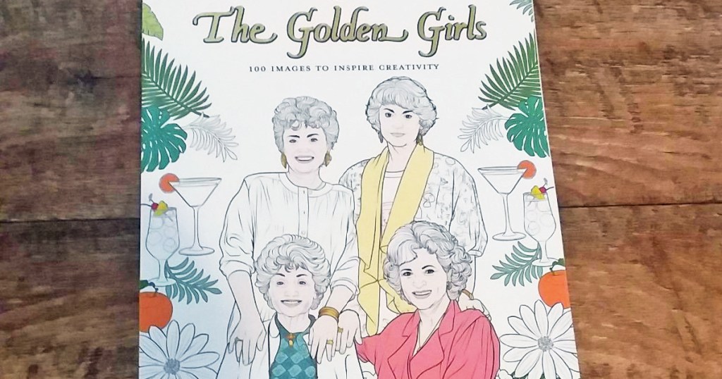 golden girls coloring book on wood table