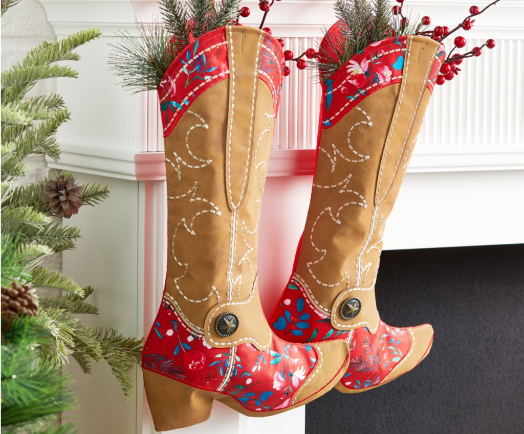The Pioneer Woman Set of 2 Red Floral Boot Christmas Stockings displayed with fruit inside of it
