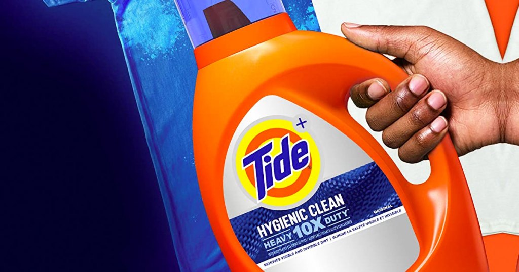 hand holding bottle of Tide Hygienic Clean