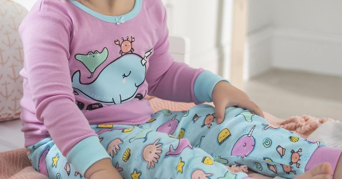 toddler girl wearing gerber narwhal pajama set
