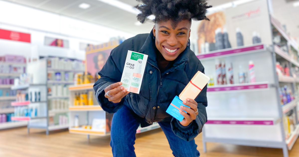 woman holding skincare products inside ULTA store