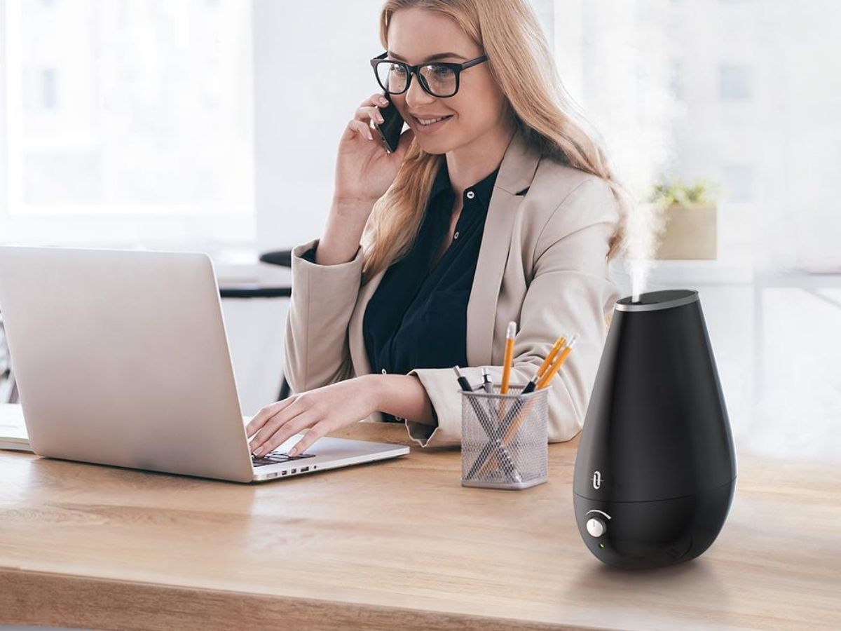 Taotronics black 1.8L Small Cool Mist BPA-Free Humidifier on office desk