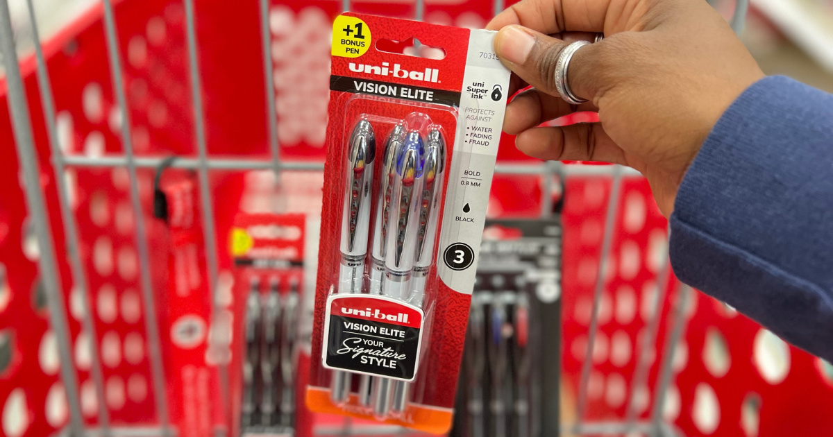 hand holding pack of gel pens in store