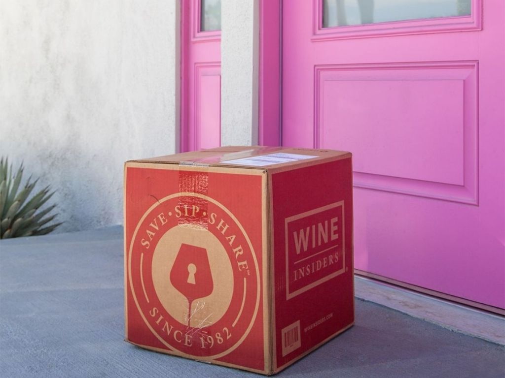 Wine Insider box on porch in front of pink door