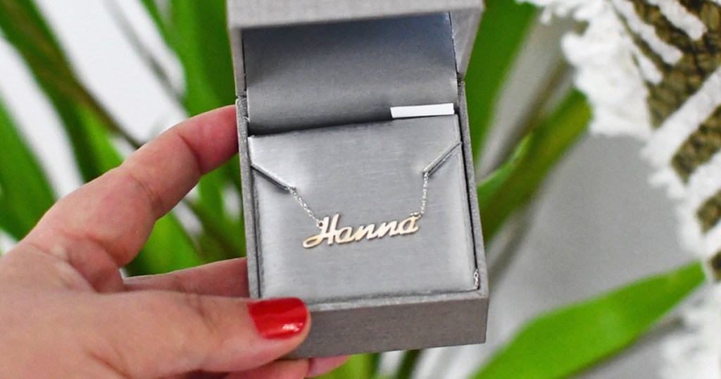 silver name necklace in jewelry box