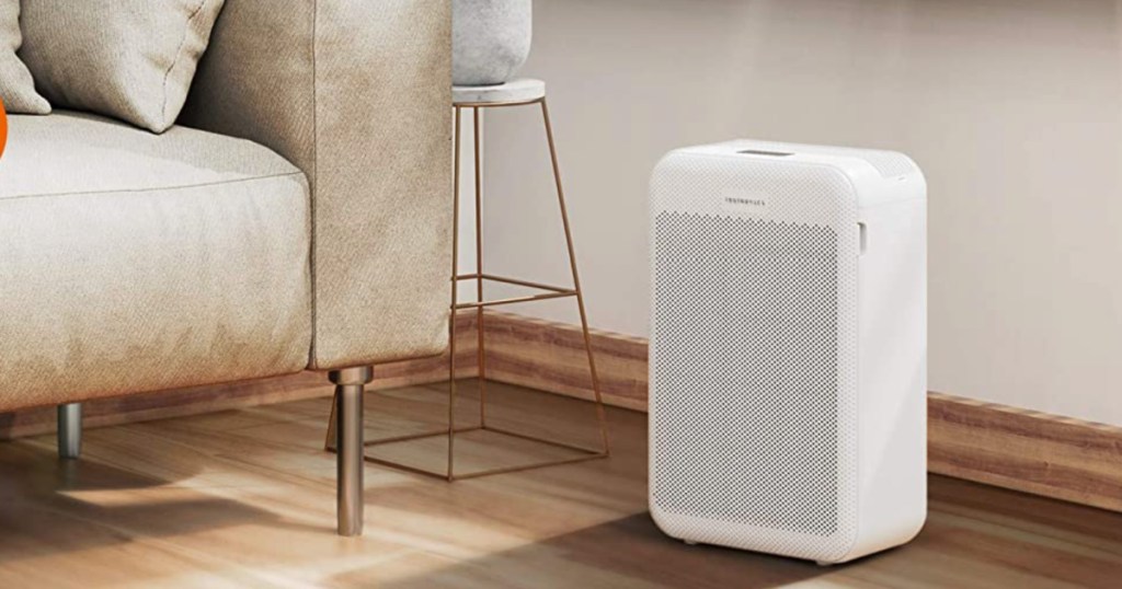 white air purifier in living room