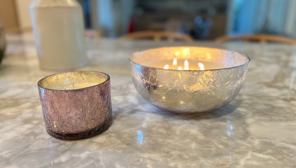 two mercury glass candles on kitchen counter