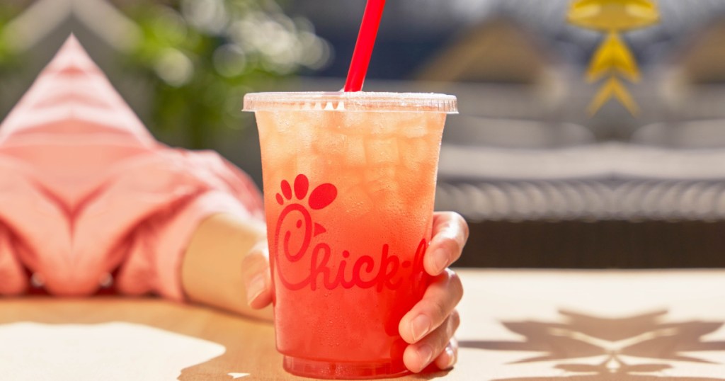 hand holding chick fil a drink
