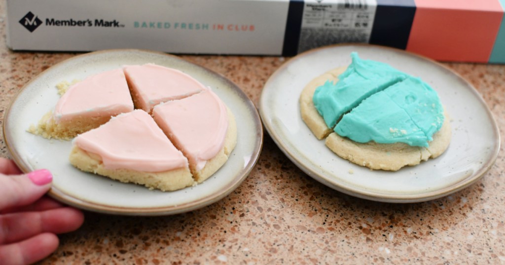 comparing sam's club sugar cookies and crumbl cookies on a plate