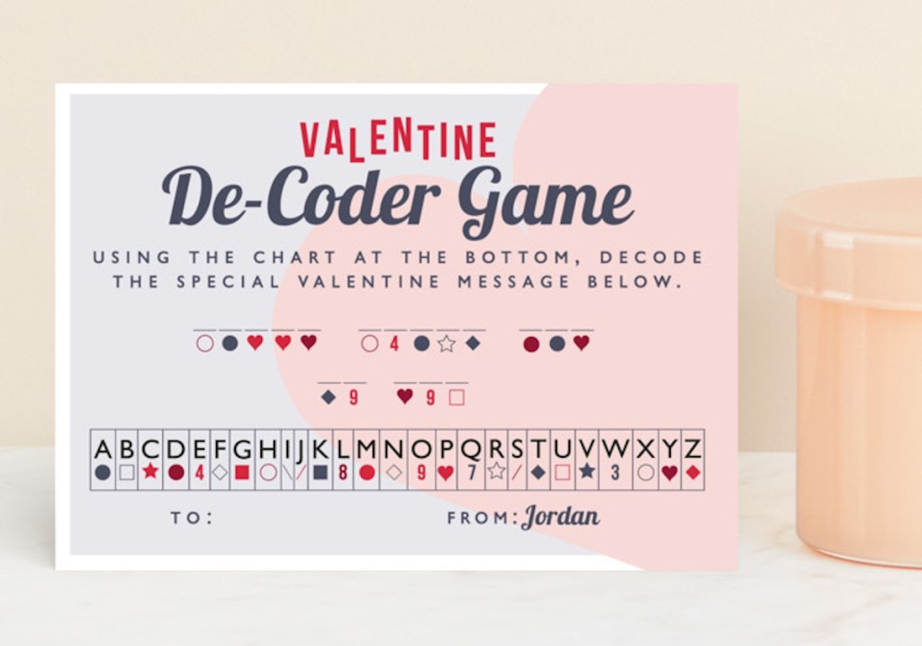 valentines decoder game on minted valentines day card on countertop