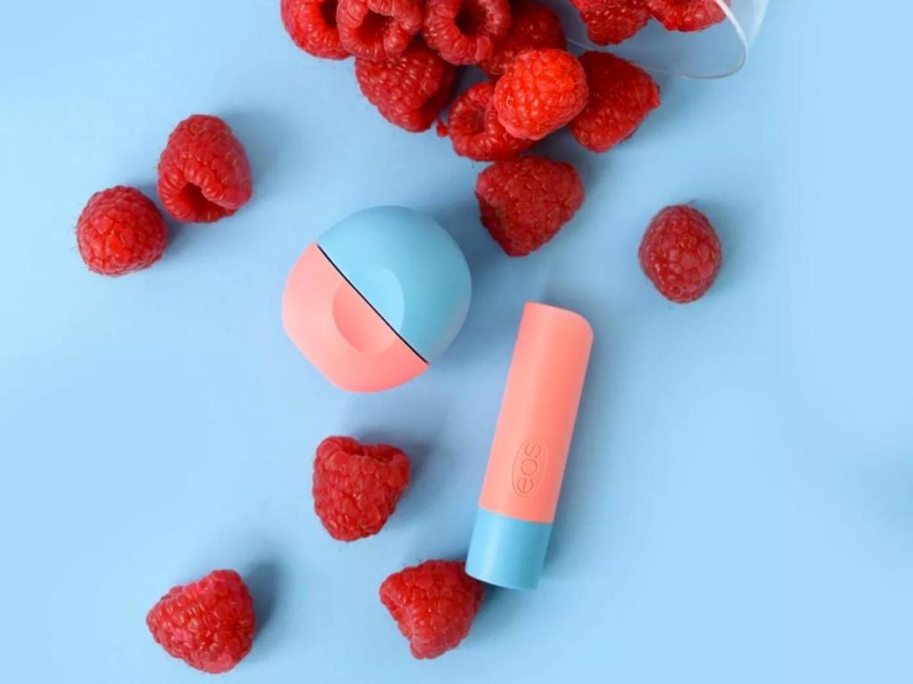 eos lip balm stick and sphere with raspberries