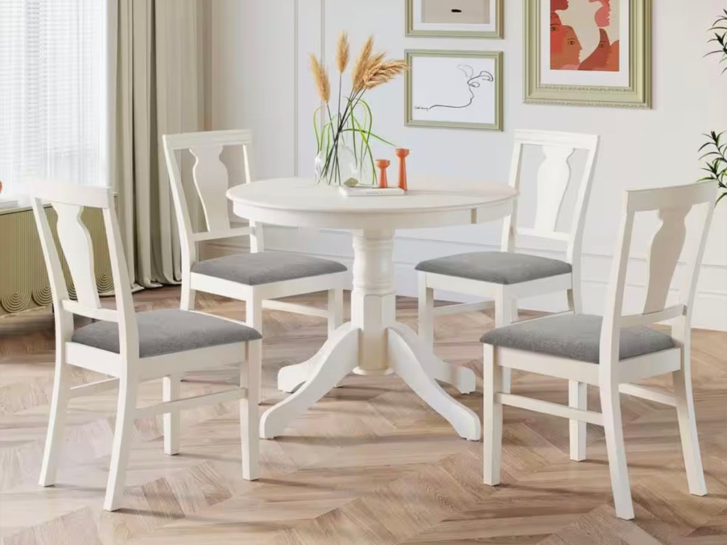 white and gray dining table set with four chairs