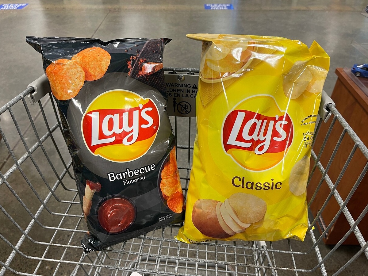 2 bags of potato chips in a shopping cart