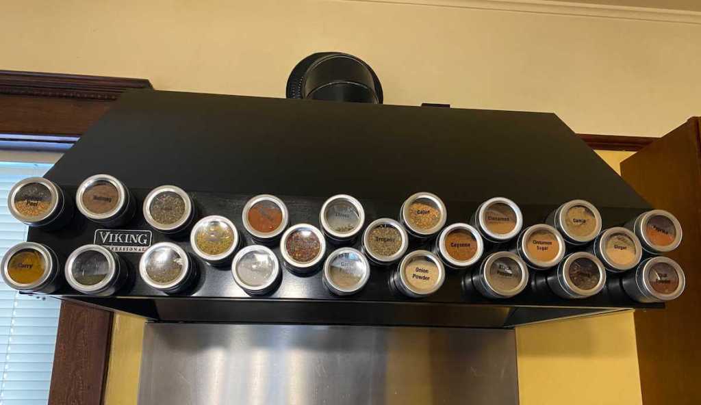 magnetic spice tins sticking on black viking range hood - best things to buy on amazon