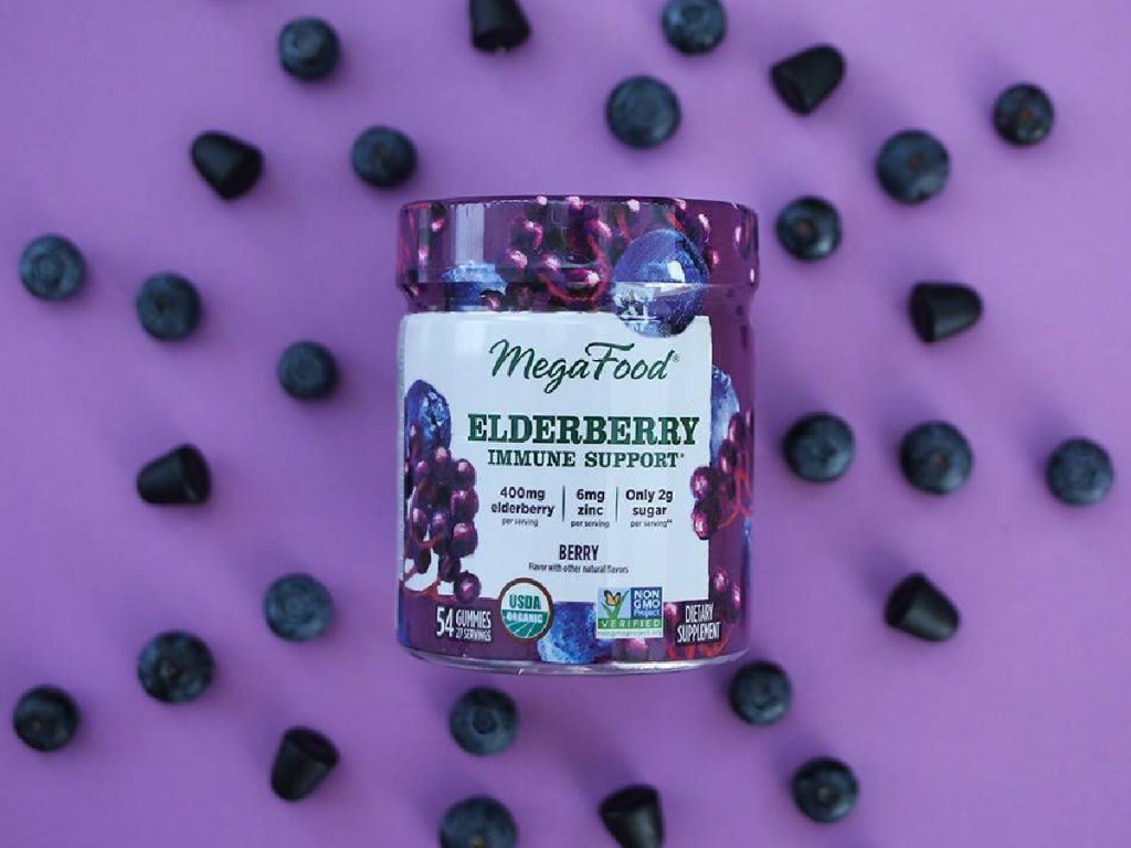 bottle of Elderberry gummy vitamins sitting on purple background